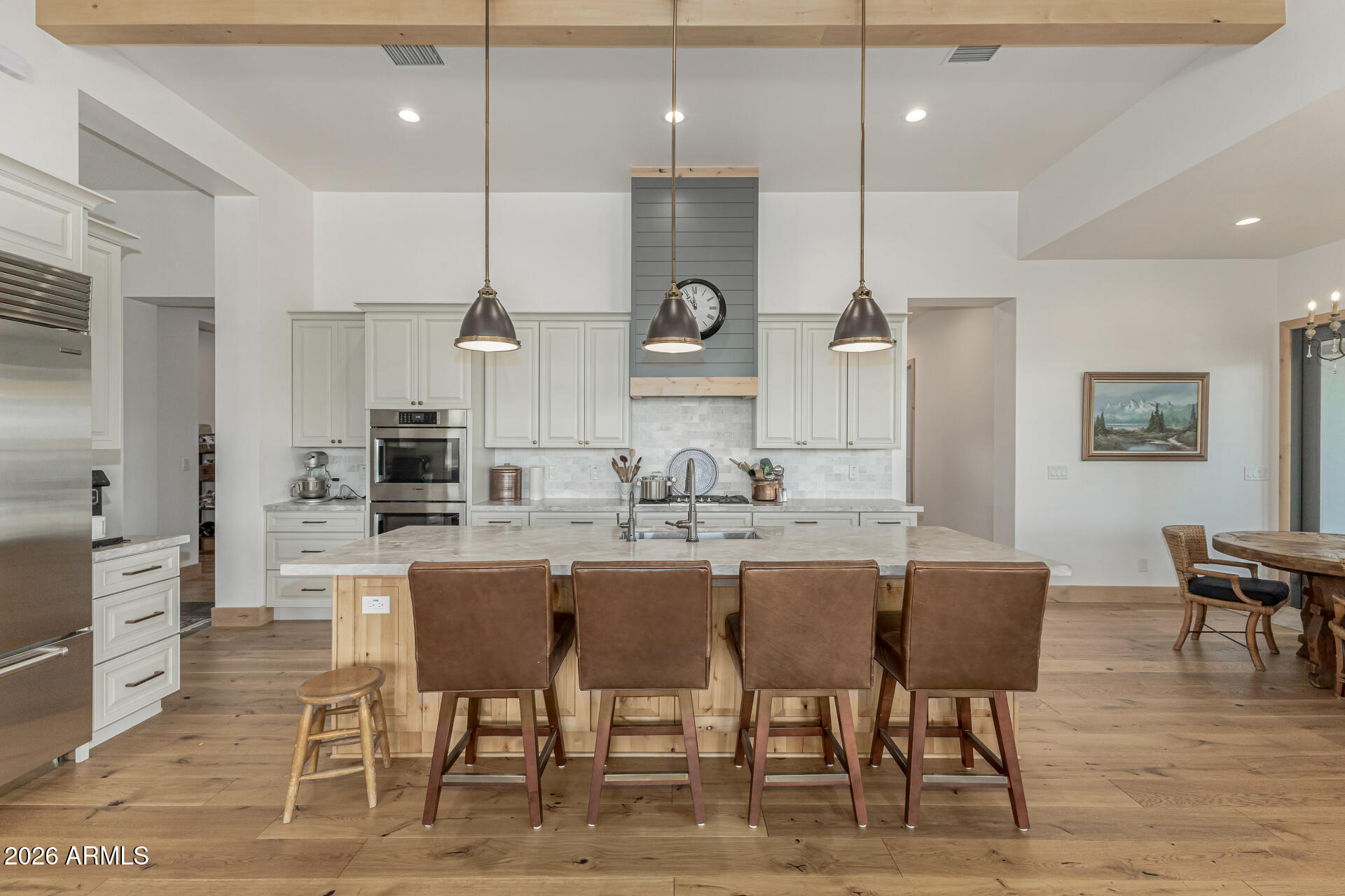 31210 North 68th Street Cave Creek, AZ 85331 - Photo 17 of 61 a large kitchen with a table and chairs