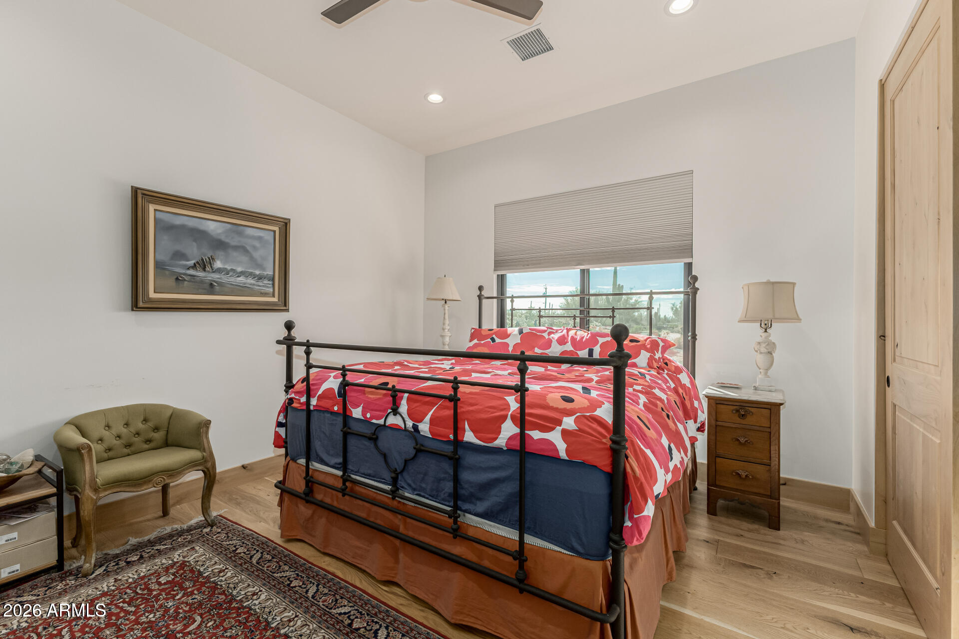 31210 North 68th Street Cave Creek, AZ 85331 - Photo 33 of 61 a bedroom with a bed and wooden floor