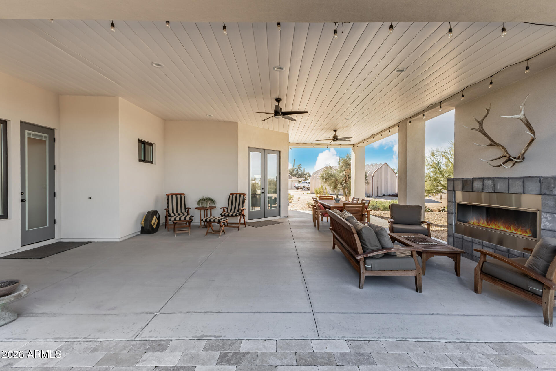 31210 North 68th Street Cave Creek, AZ 85331 - Photo 37 of 61 a living room with furniture and a fireplace