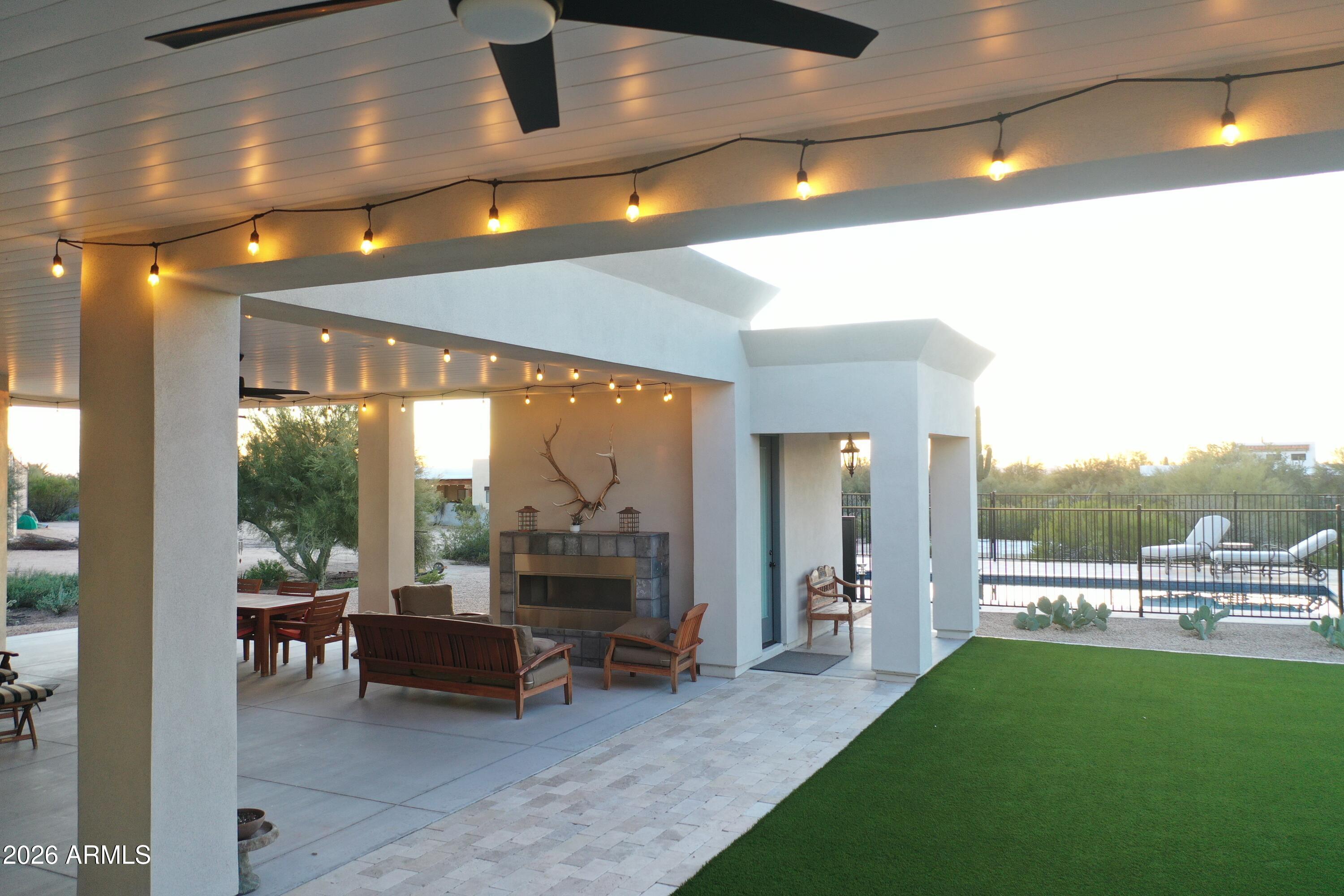 31210 North 68th Street Cave Creek, AZ 85331 - Photo 4 of 61 a living room with furniture and a large window