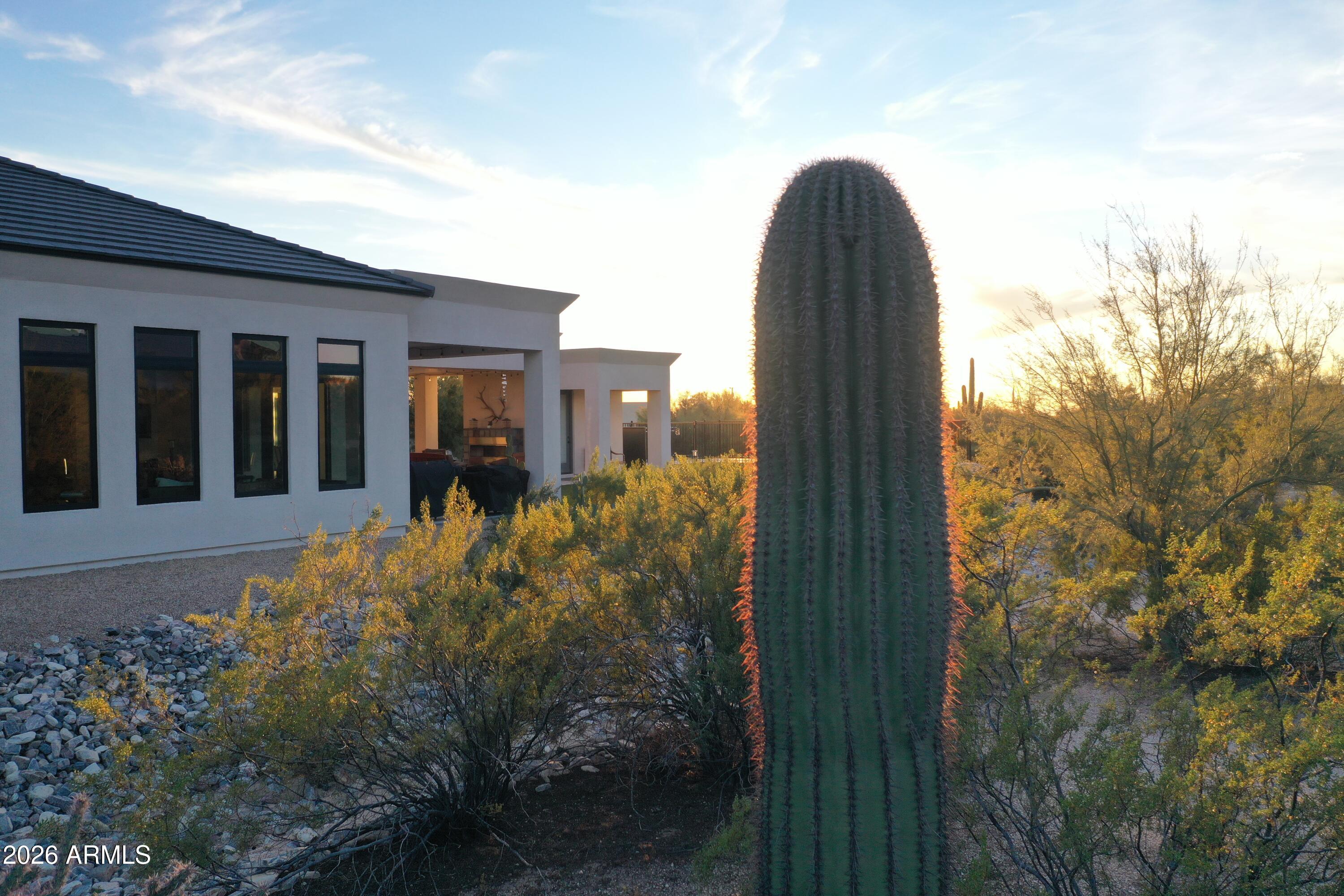 31210 North 68th Street Cave Creek, AZ 85331 - Photo 48 of 61 a front view of a house with a yard