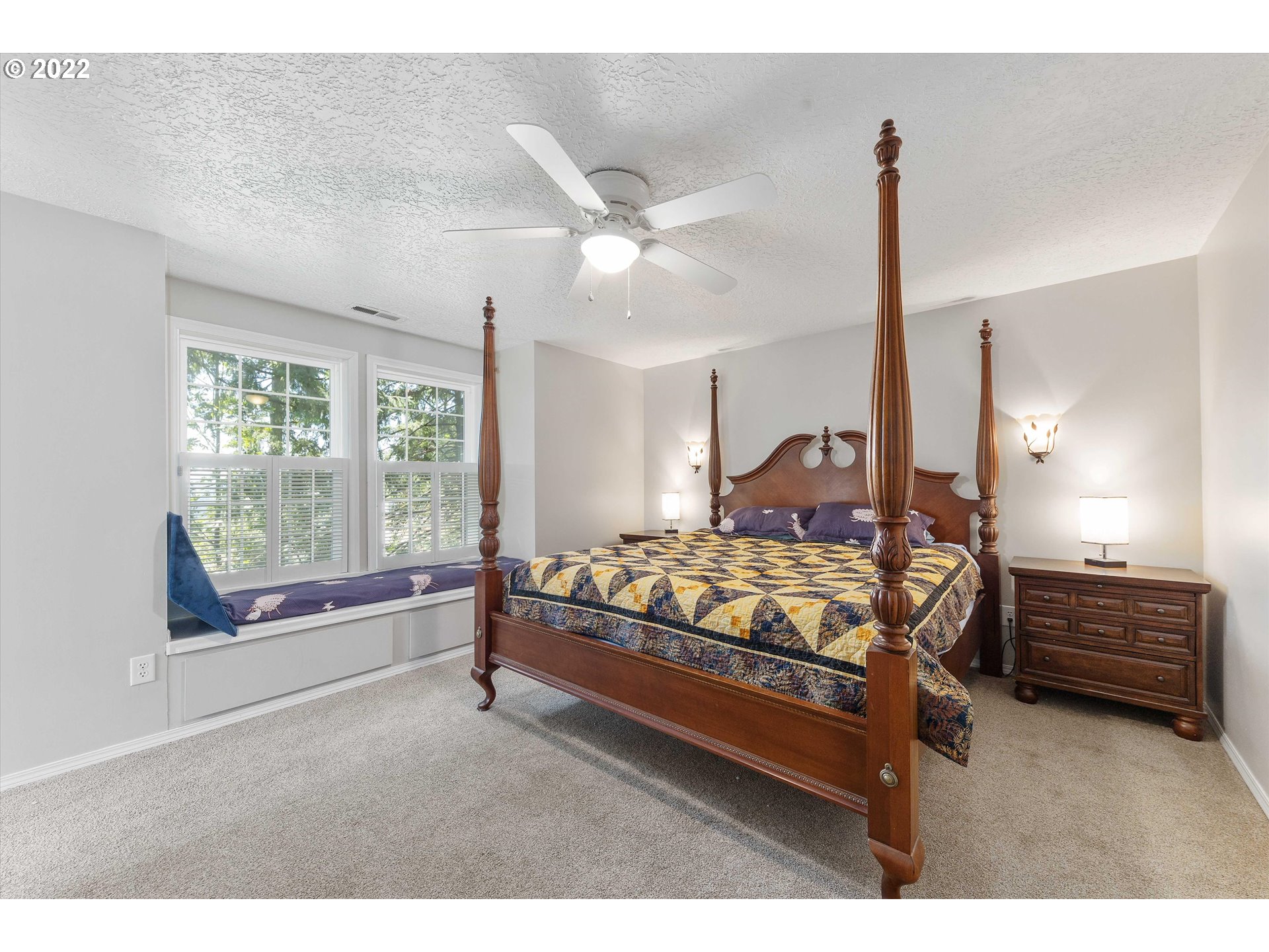 17212 Southeast Royer Road Damascus, OR 97089 - Photo 12 of 32 a bedroom with a bed and window