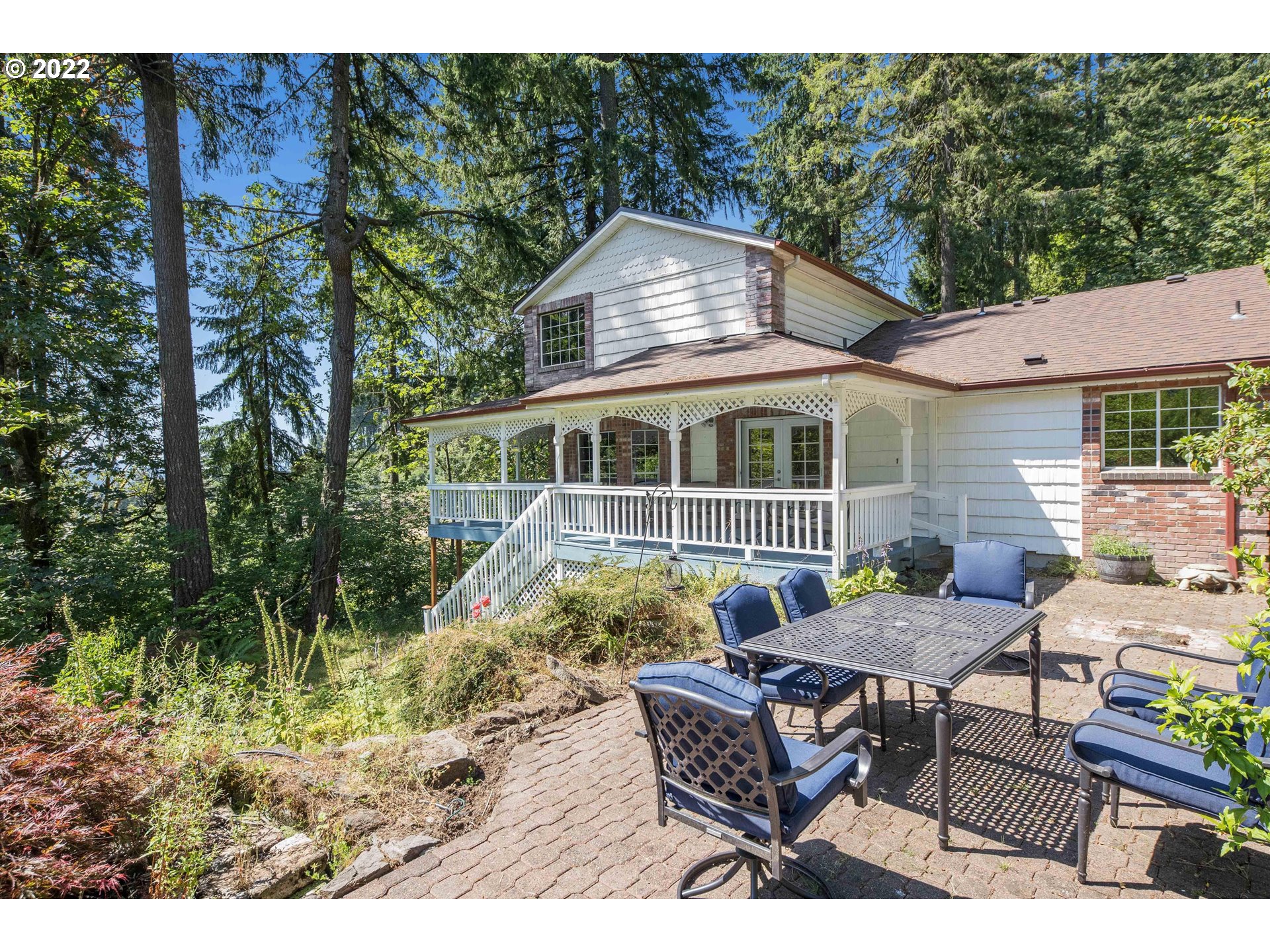 17212 Southeast Royer Road Damascus, OR 97089 - Photo 30 of 32 a view of a house with backyard and sitting area