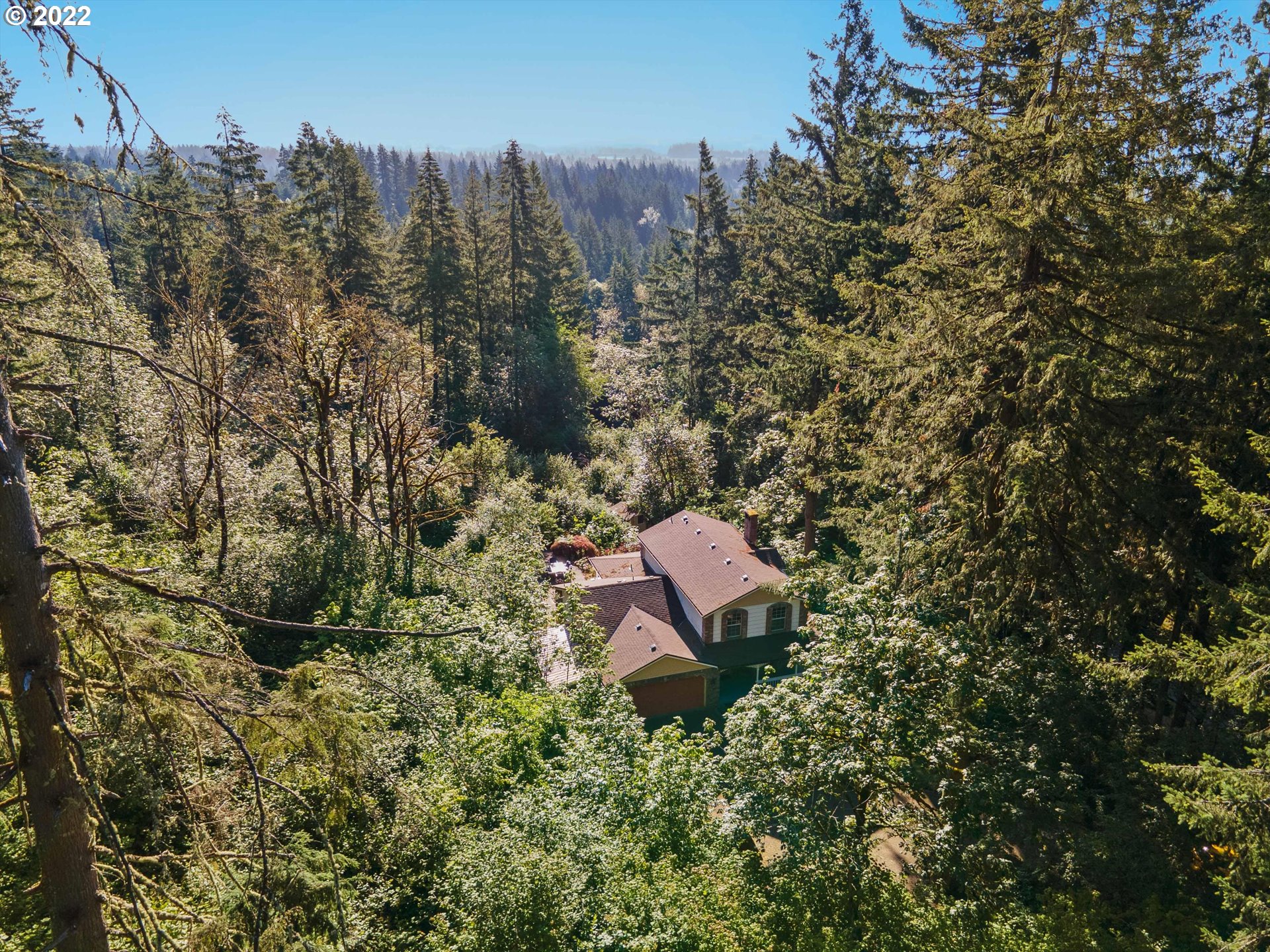 17212 Southeast Royer Road Damascus, OR 97089 - Photo 32 of 32 a view of a house with a yard and sitting area