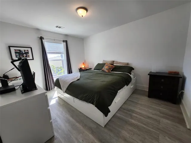 a view of a house with patio outdoor dining space and furniture