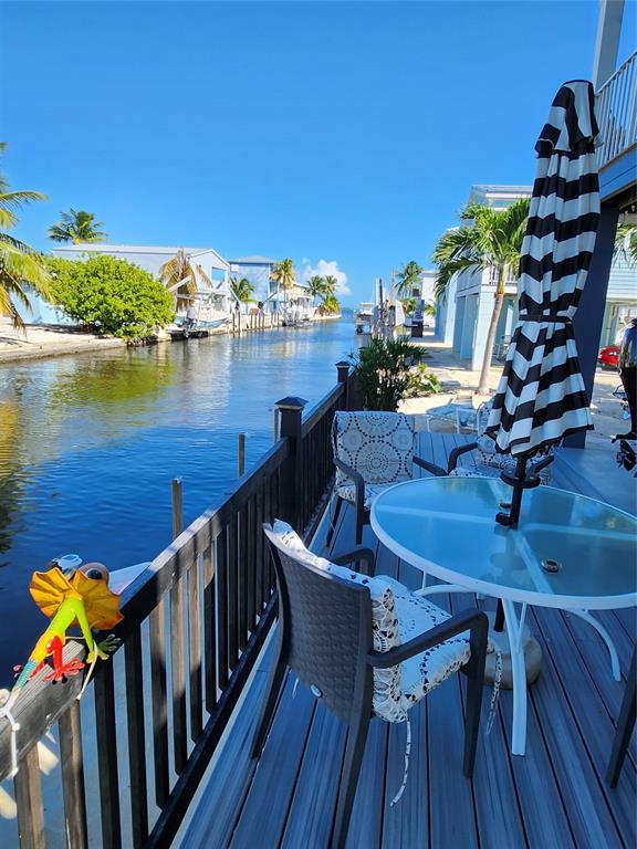 31547 Ave D Big Pine Key, FL 33043 - Photo 24 of 42 a view of a chairs on the roof deck