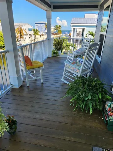 a view of a terrace with chairs