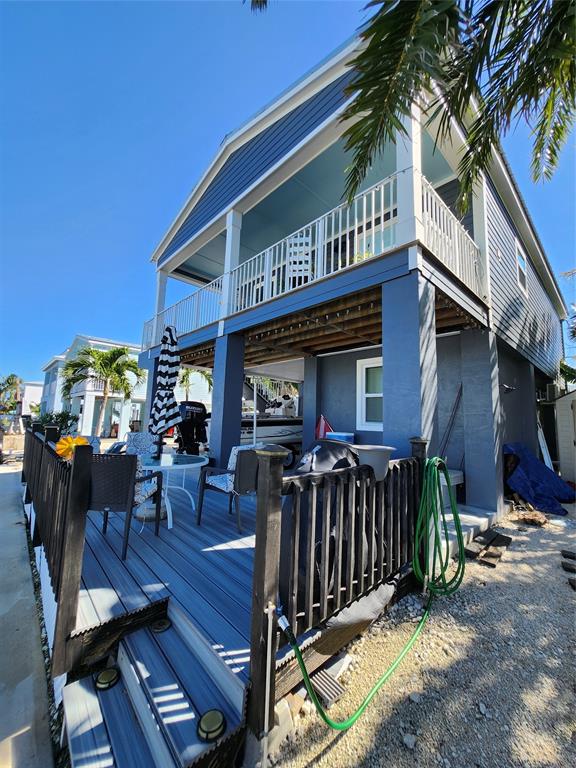 31547 Ave D Big Pine Key, FL 33043 - Photo 36 of 42 a view of a house with patio