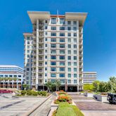 a front view of a building with street view