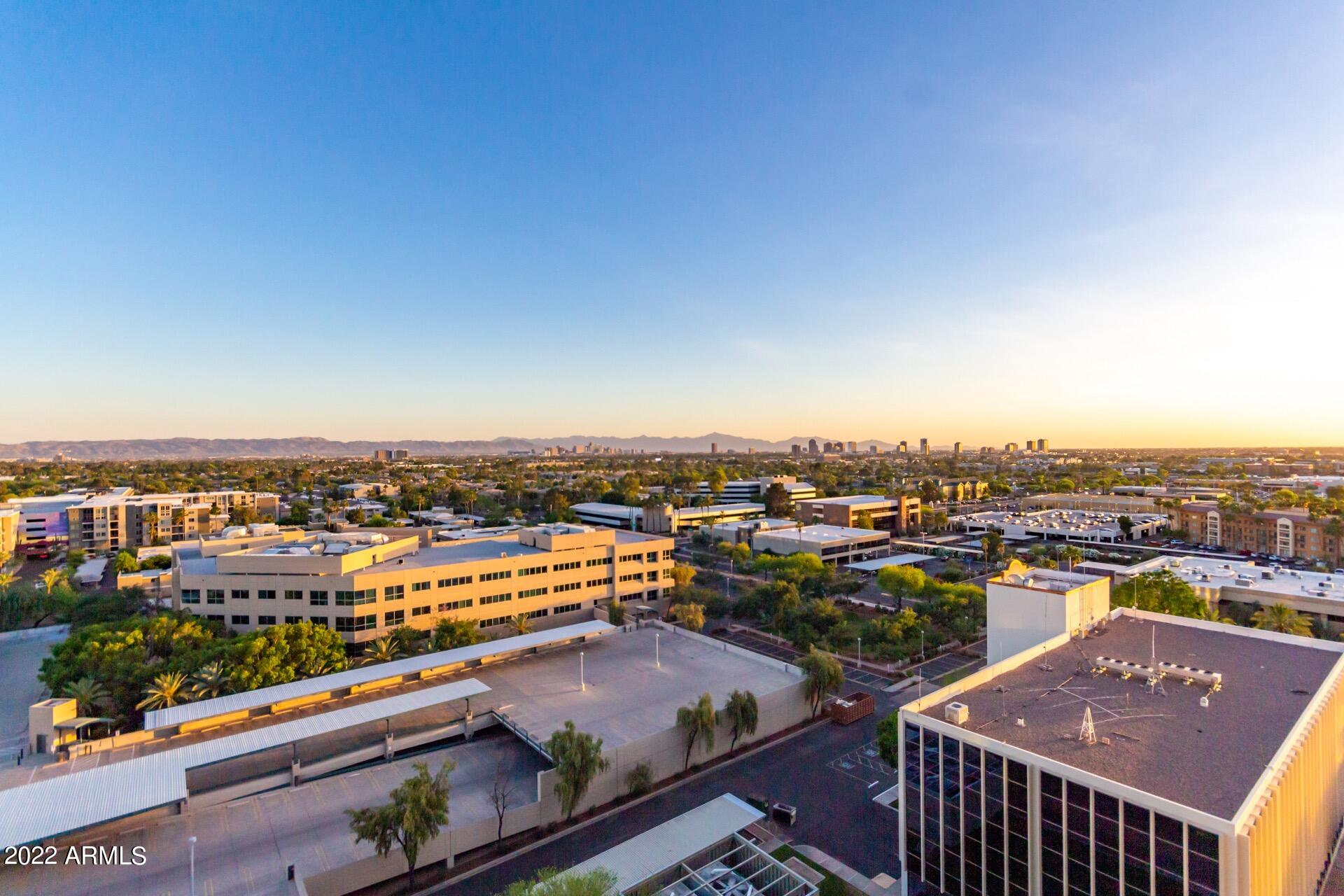 2211 East Camelback Road, Unit 1104 Phoenix, AZ 85016 - Photo 30 of 43 a view of a city from a terrace