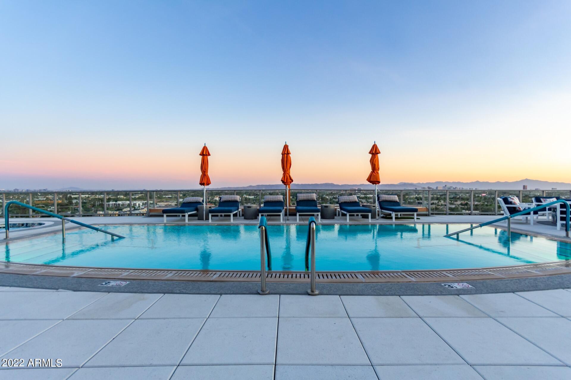 2211 East Camelback Road, Unit 1104 Phoenix, AZ 85016 - Photo 34 of 43 a view of a lake and a yard