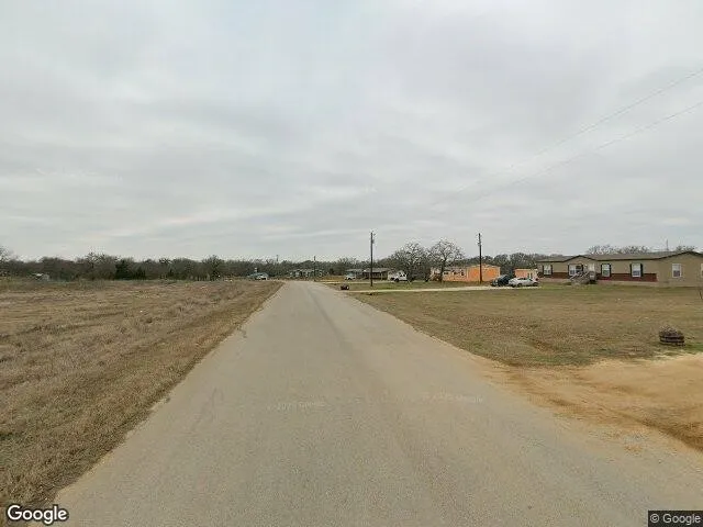 a car parked in front of a house