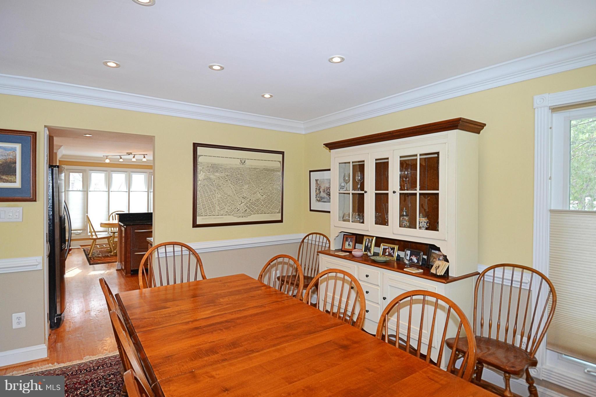 11634 Chapel Cross Way Reston, VA 20194 - Photo 11 of 30 a view of a a dining room with furniture window and wooden floor