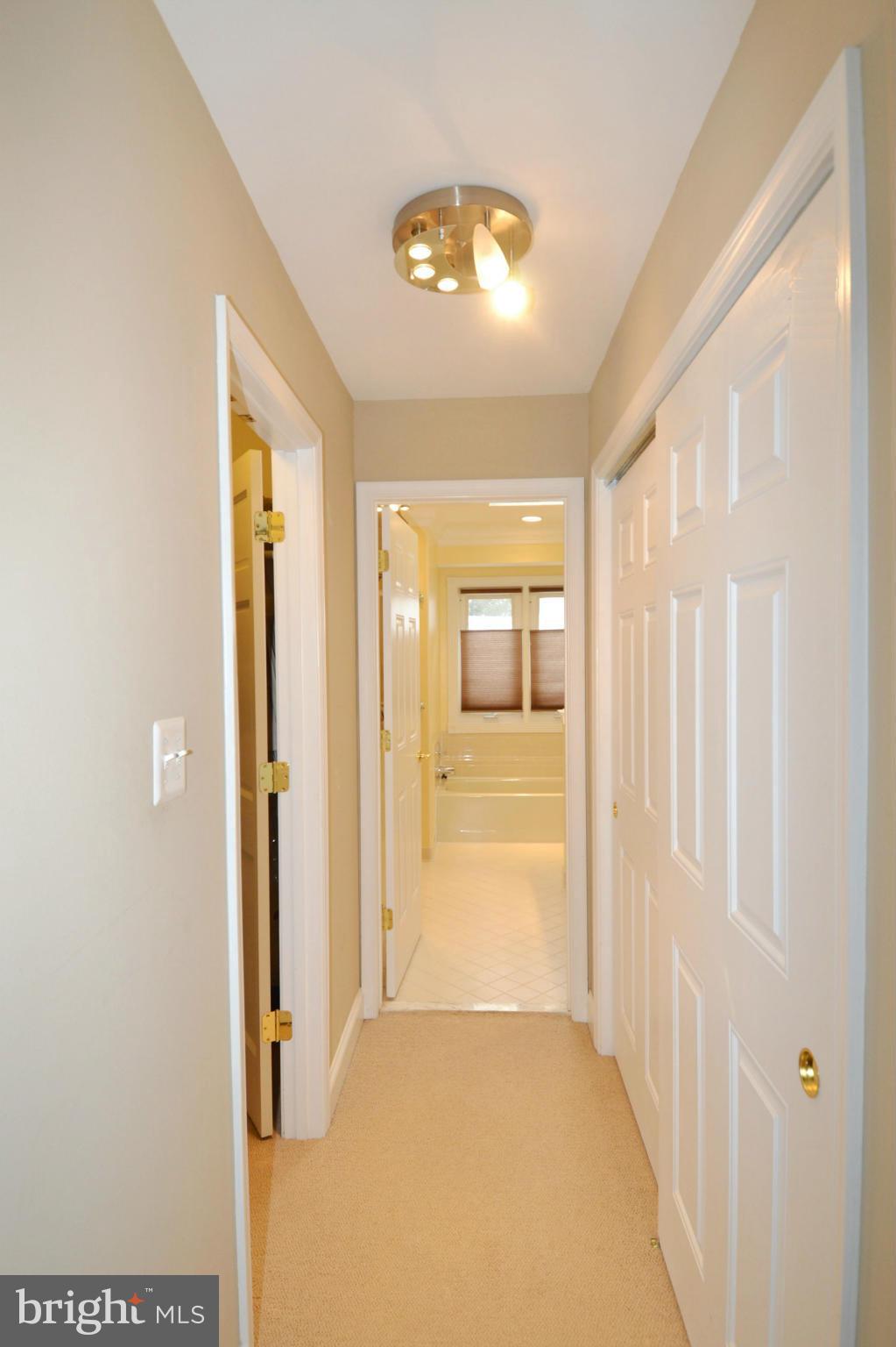 11634 Chapel Cross Way Reston, VA 20194 - Photo 15 of 30 a view of a hallway with a dining room