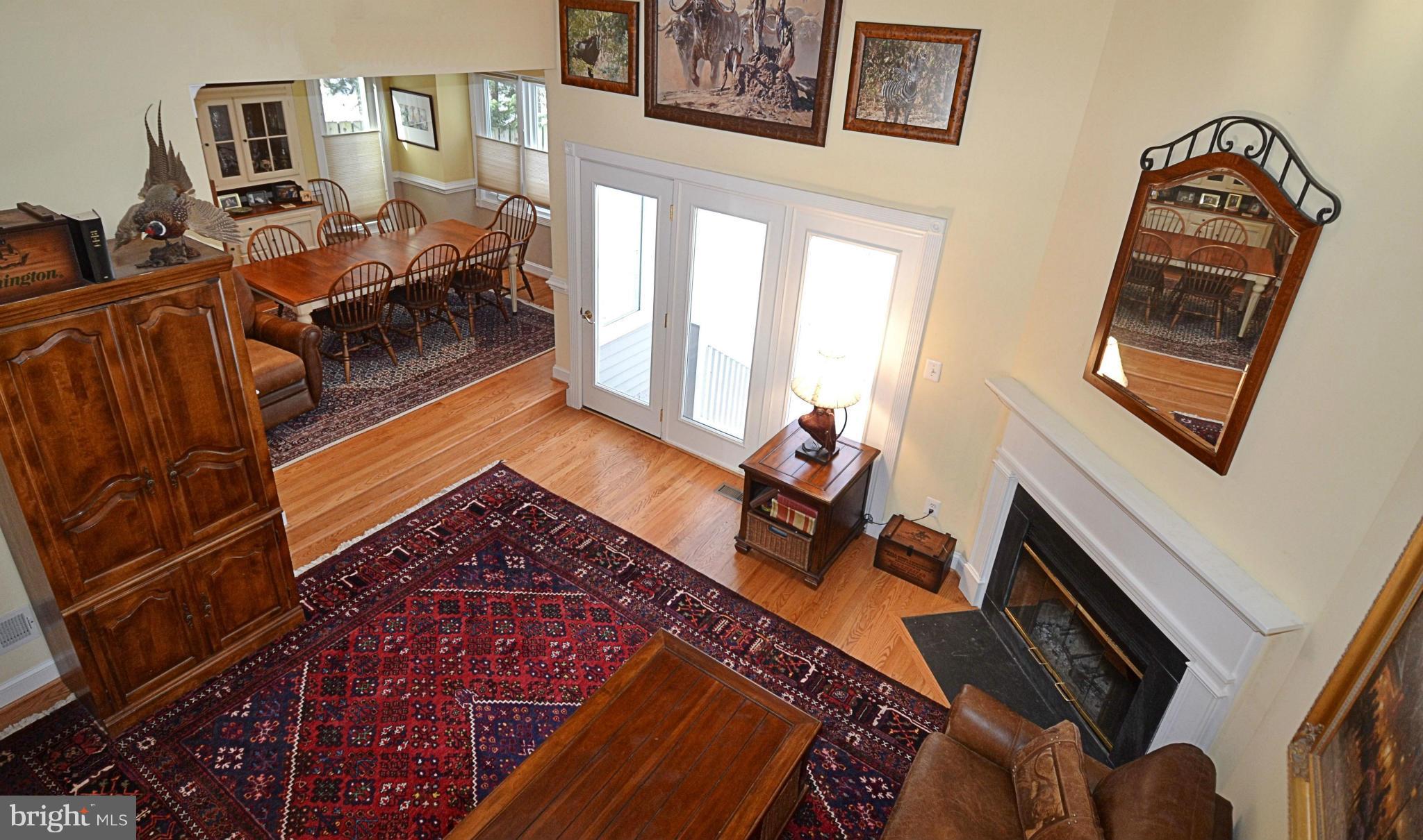 11634 Chapel Cross Way Reston, VA 20194 - Photo 8 of 30 a bedroom with furniture and a fireplace