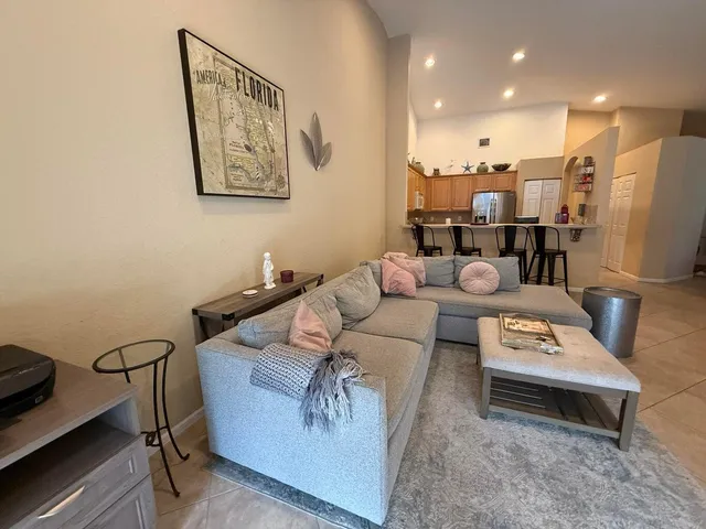 a bedroom with a bed and a table in it