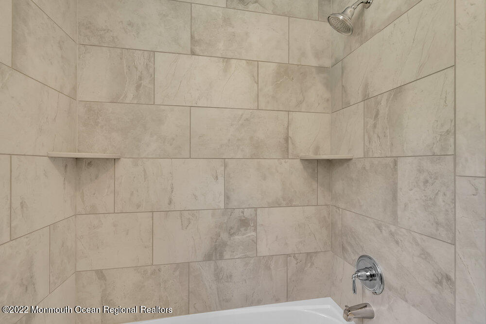 10 Sander Way Bayville, NJ 08721 - Photo 16 of 30 a bathroom with a shower