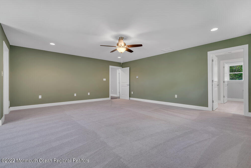 10 Sander Way Bayville, NJ 08721 - Photo 20 of 30 a view of a room with a ceiling fan window and a ceiling fan