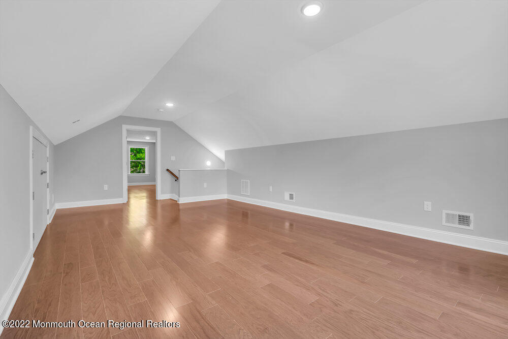 10 Sander Way Bayville, NJ 08721 - Photo 26 of 30 a view of empty room with wooden floor