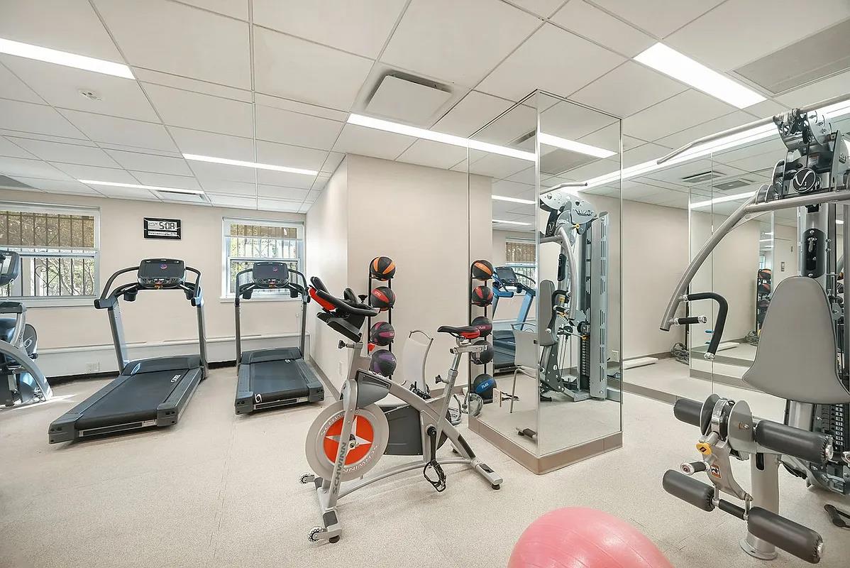 75 Henry Street, Unit 14C Brooklyn, NY 11201 - Photo 10 of 17 a view of a room with gym equipment