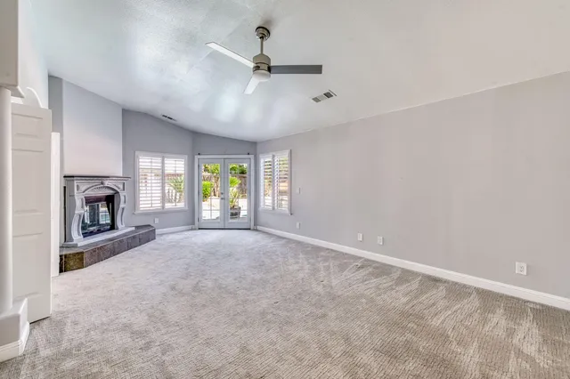 a kitchen with stainless steel appliances granite countertop a stove sink and cabinets