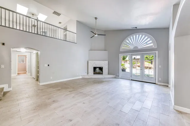 a house with a tree in front of it