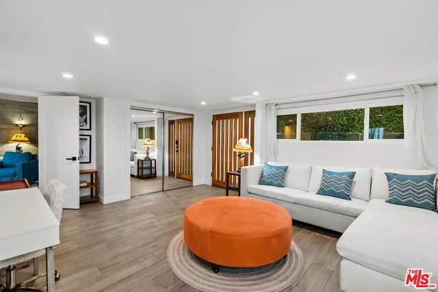 a bathroom with a toilet a sink and a shower