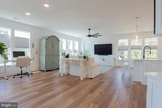 a view of a living room and a flat screen tv