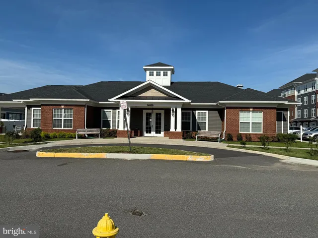 a front view of a house with swimming pool
