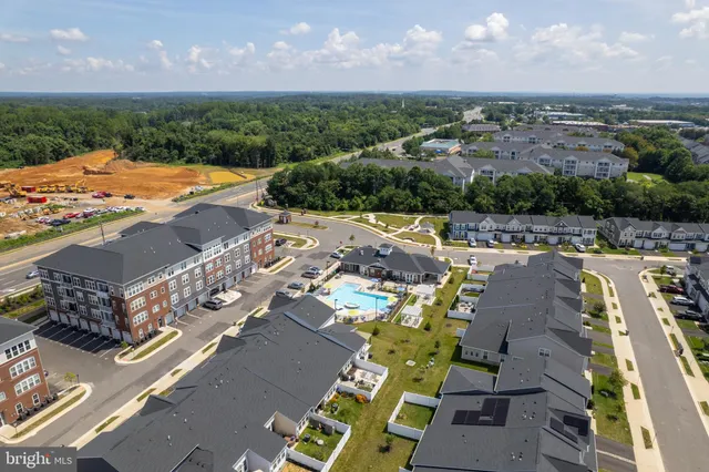 a view of a swimming pool with seating area