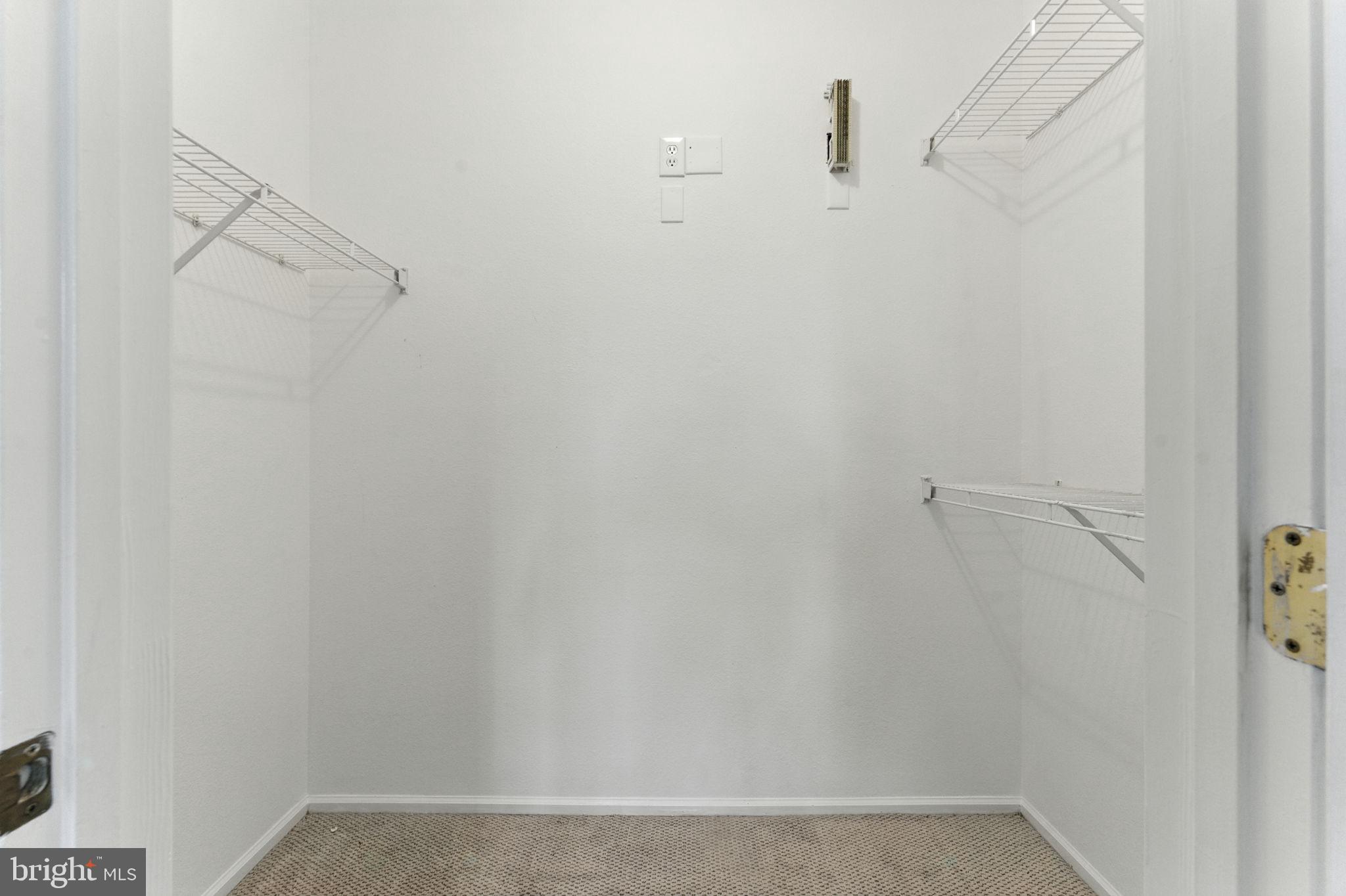 1591 Spring Gate Dr., Unit 3314 McLean, VA 22102 - Photo 17 of 56 a view of small space with racks on the wall