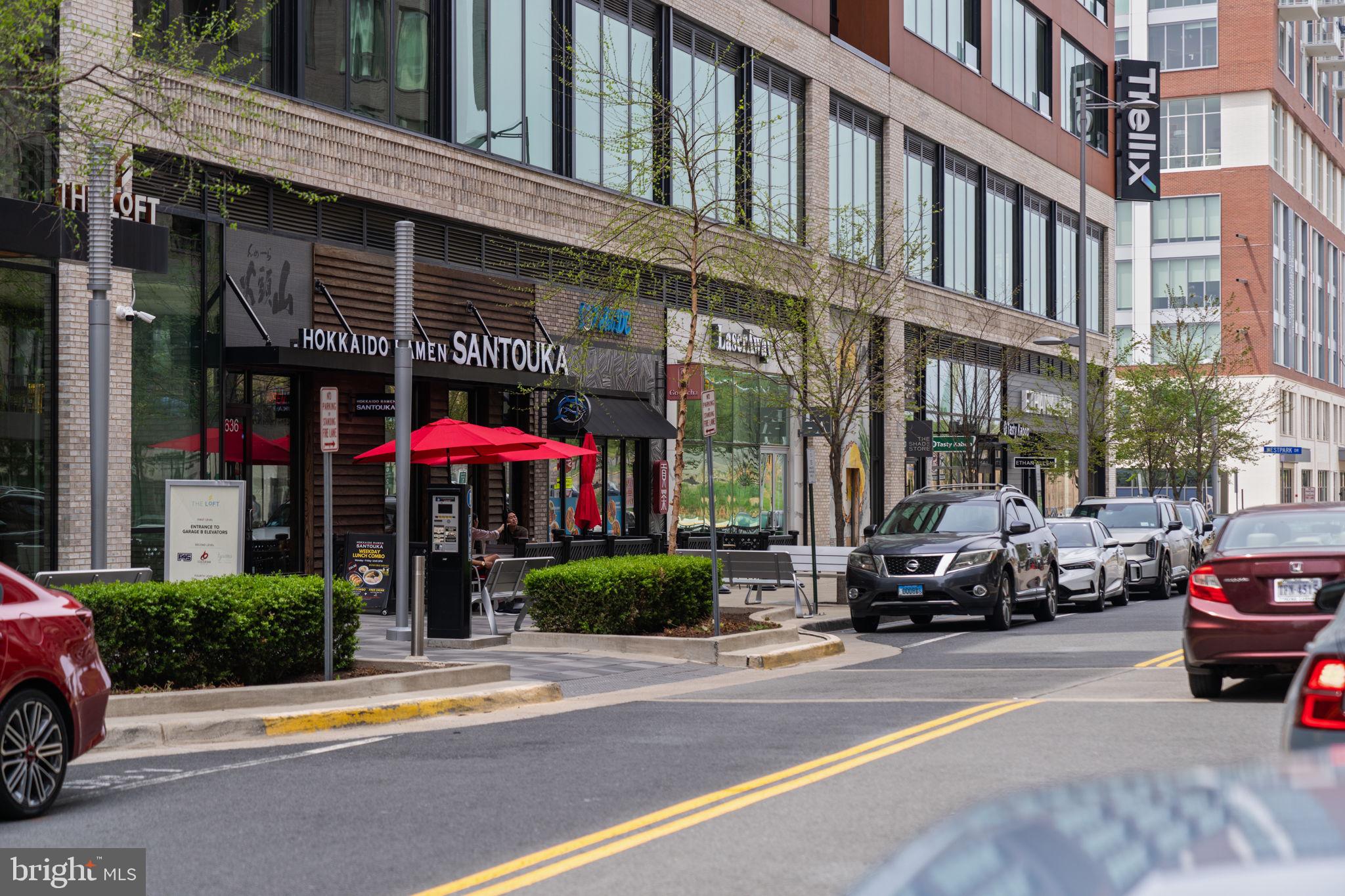 1591 Spring Gate Dr., Unit 3314 McLean, VA 22102 - Photo 23 of 56 a view of a cars park in front of a building
