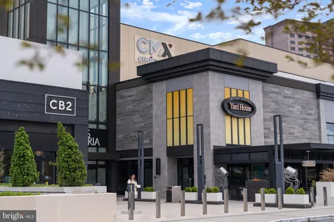 a view of a building and car parked