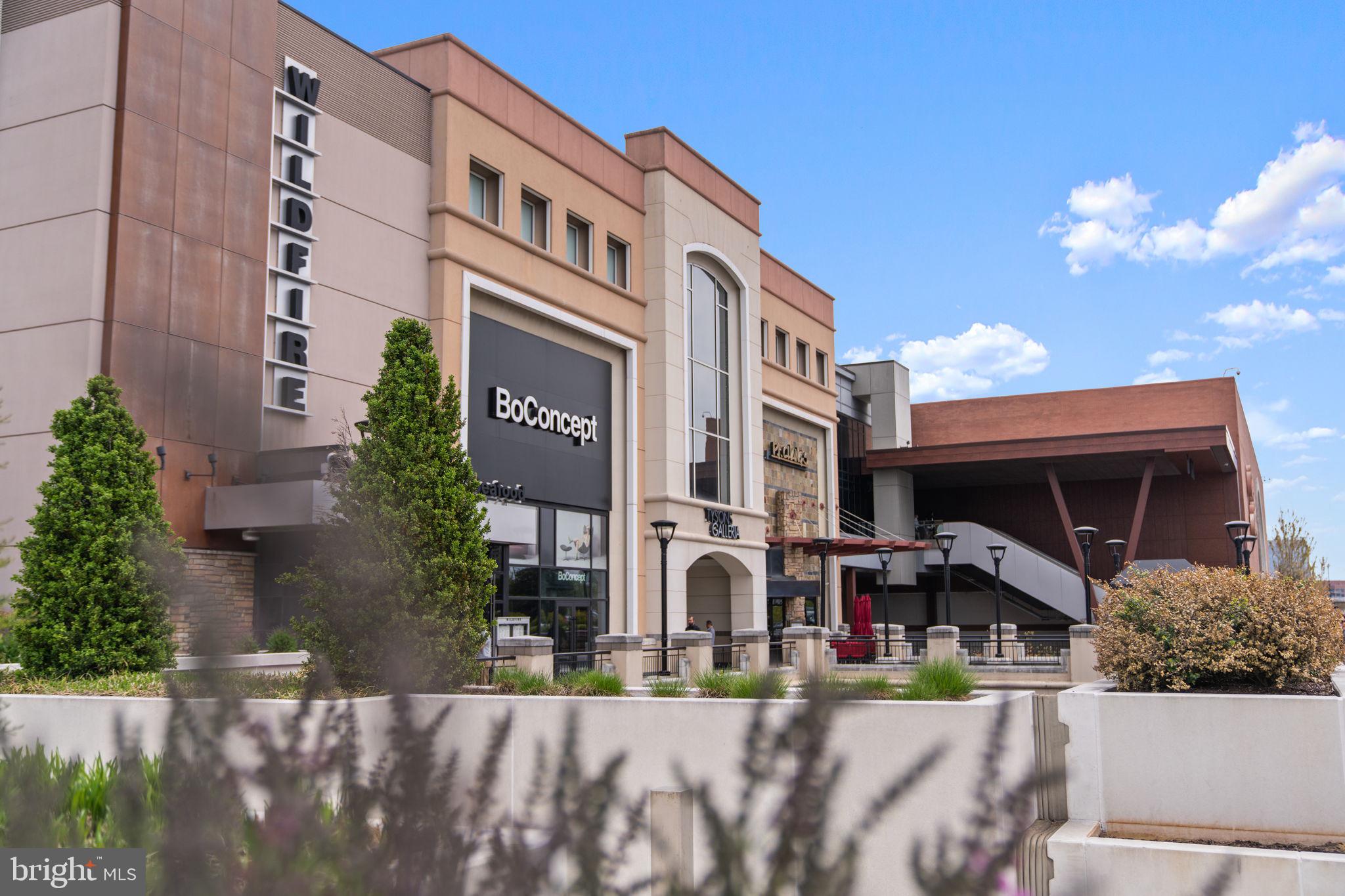 1591 Spring Gate Dr., Unit 3314 McLean, VA 22102 - Photo 43 of 56 a front view of a building with garden