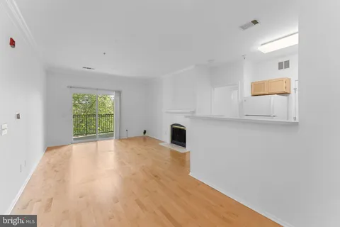 a view of a kitchen with a sink