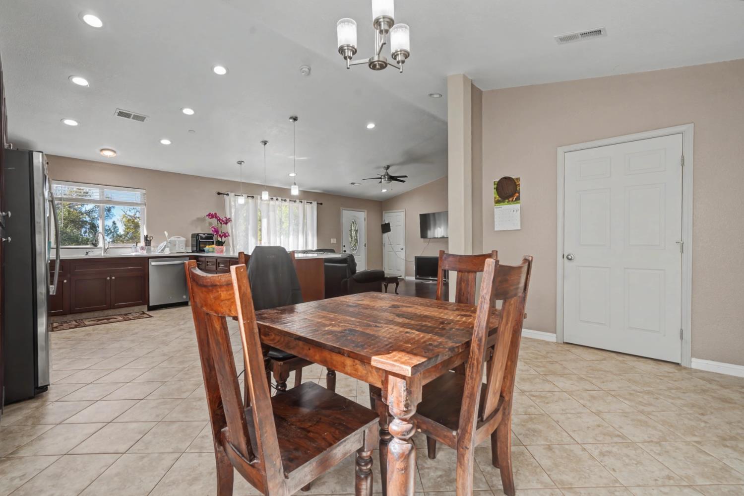 12900 New York Ranch Road Jackson, CA 95642 - Photo 13 of 31 a view of a dining room with furniture