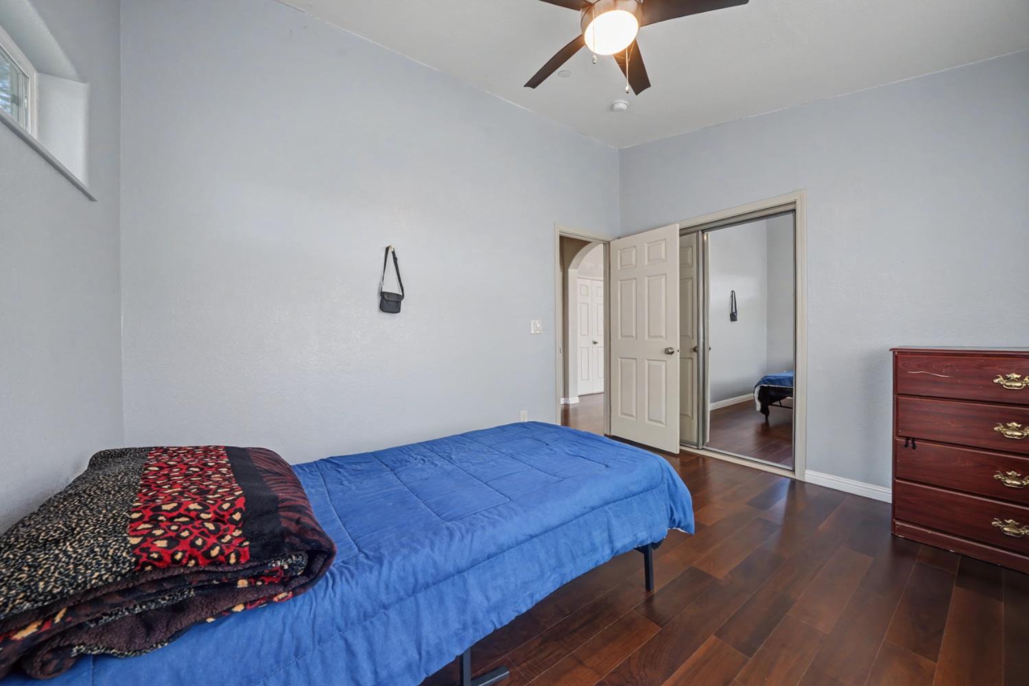 12900 New York Ranch Road Jackson, CA 95642 - Photo 18 of 31 a bedroom with a bed and a dresser