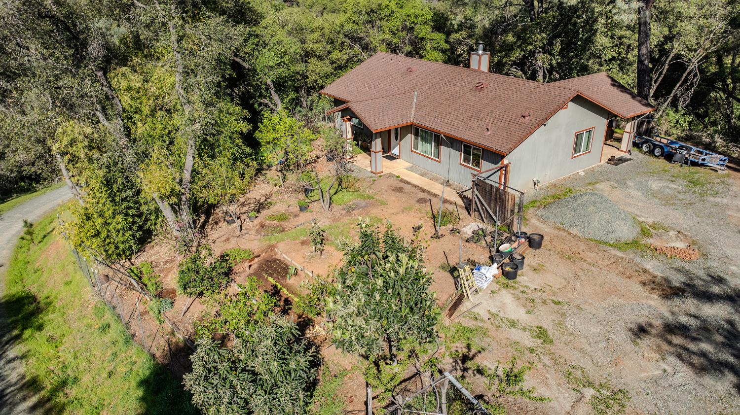 12900 New York Ranch Road Jackson, CA 95642 - Photo 24 of 31 a view of a house with a yard