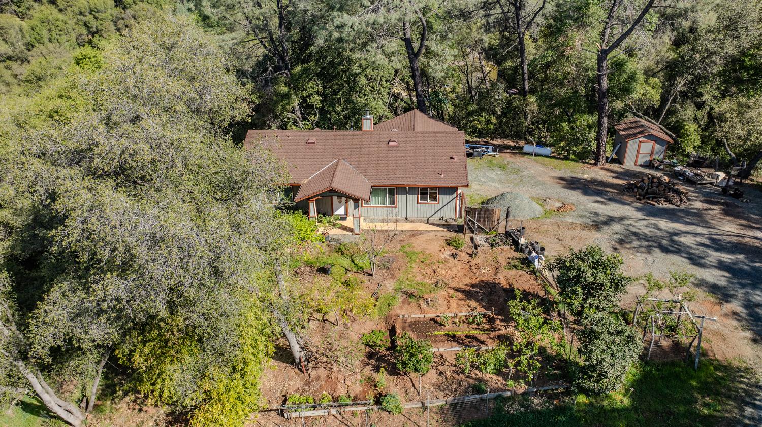 12900 New York Ranch Road Jackson, CA 95642 - Photo 26 of 31 a view of a house with a yard