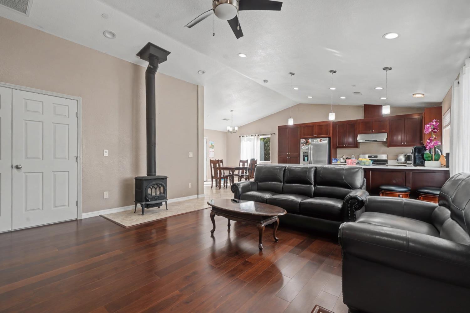 12900 New York Ranch Road Jackson, CA 95642 - Photo 4 of 31 a living room with furniture and a wooden floor