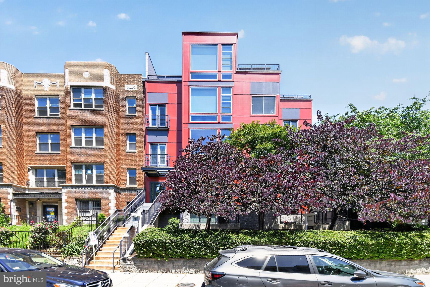 1443 Chapin Street Northwest, Unit 403 Washington, DC 20009 - Photo 22 of 24 front view of building with a yard