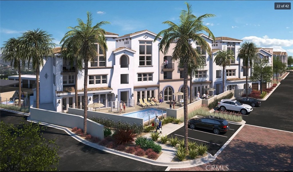 a view of multiple houses with a yard