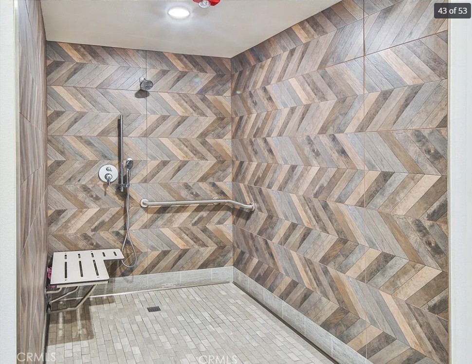 8016 Santa Fe Springs Road Whittier, CA 90602 - Photo 15 of 34 a bathroom with a shower curtain