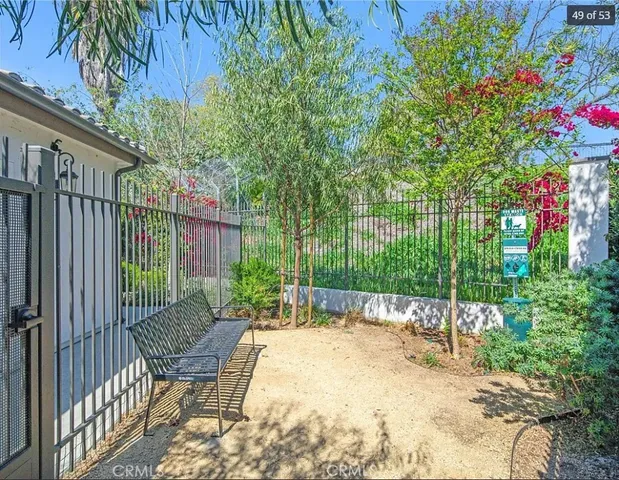 a garden view with a seating space