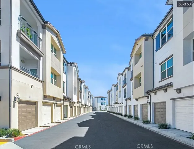 a view of a street with buildings