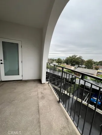 a view of balcony with furniture