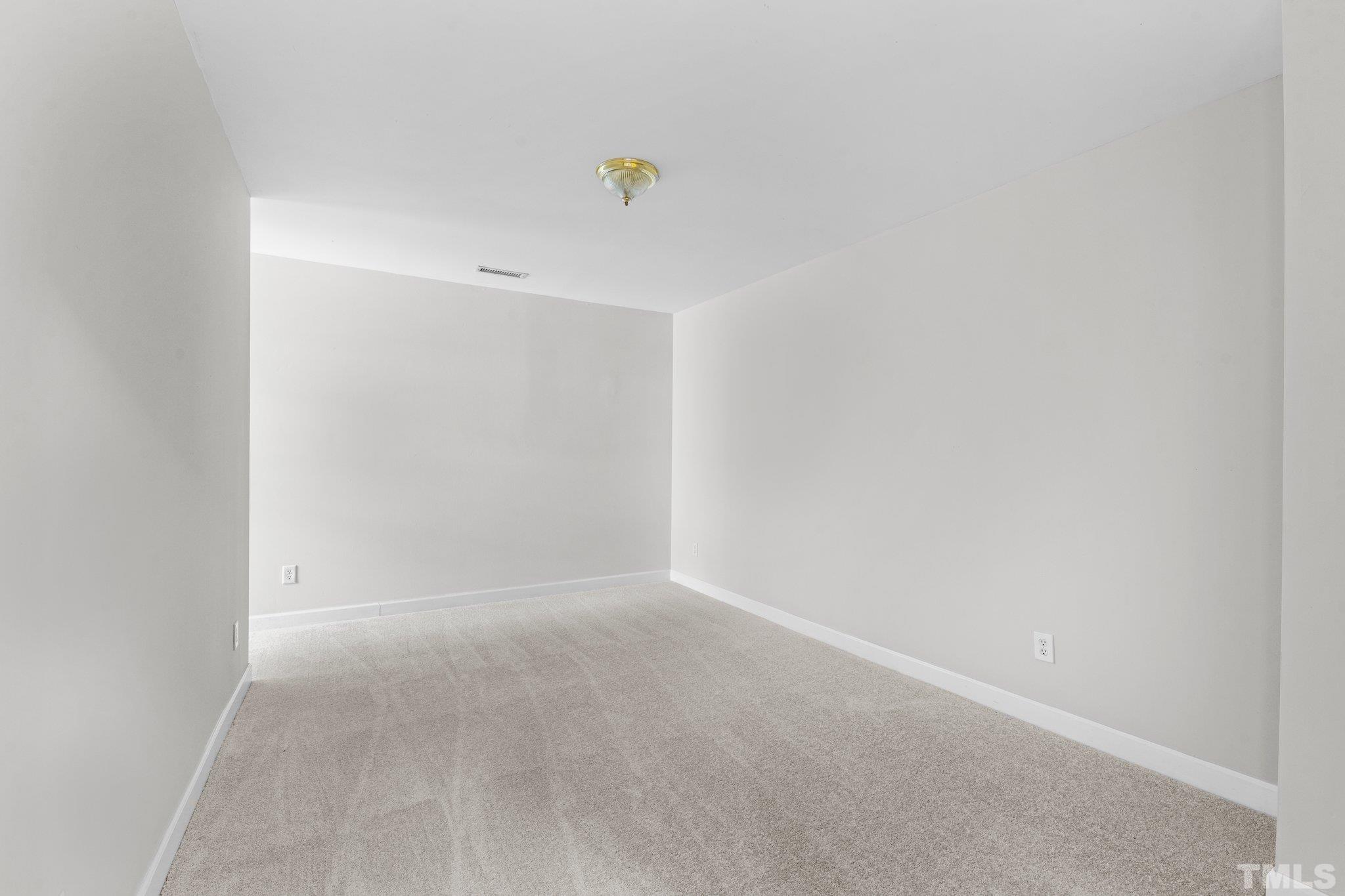 405 Jones Franklin Road Raleigh, NC 27606 - Photo 17 of 41 a view of an empty room