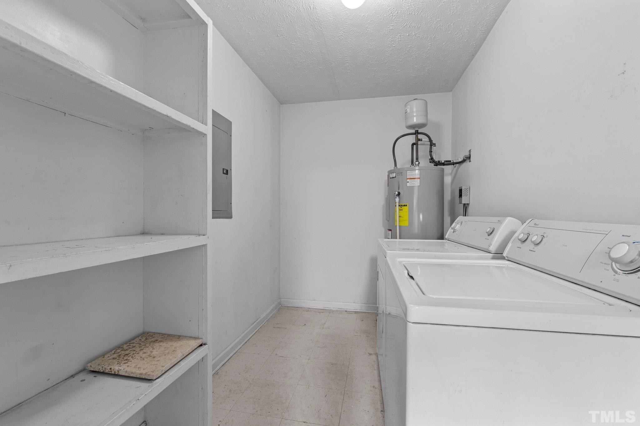 405 Jones Franklin Road Raleigh, NC 27606 - Photo 30 of 41 a utility room with dryer and washer