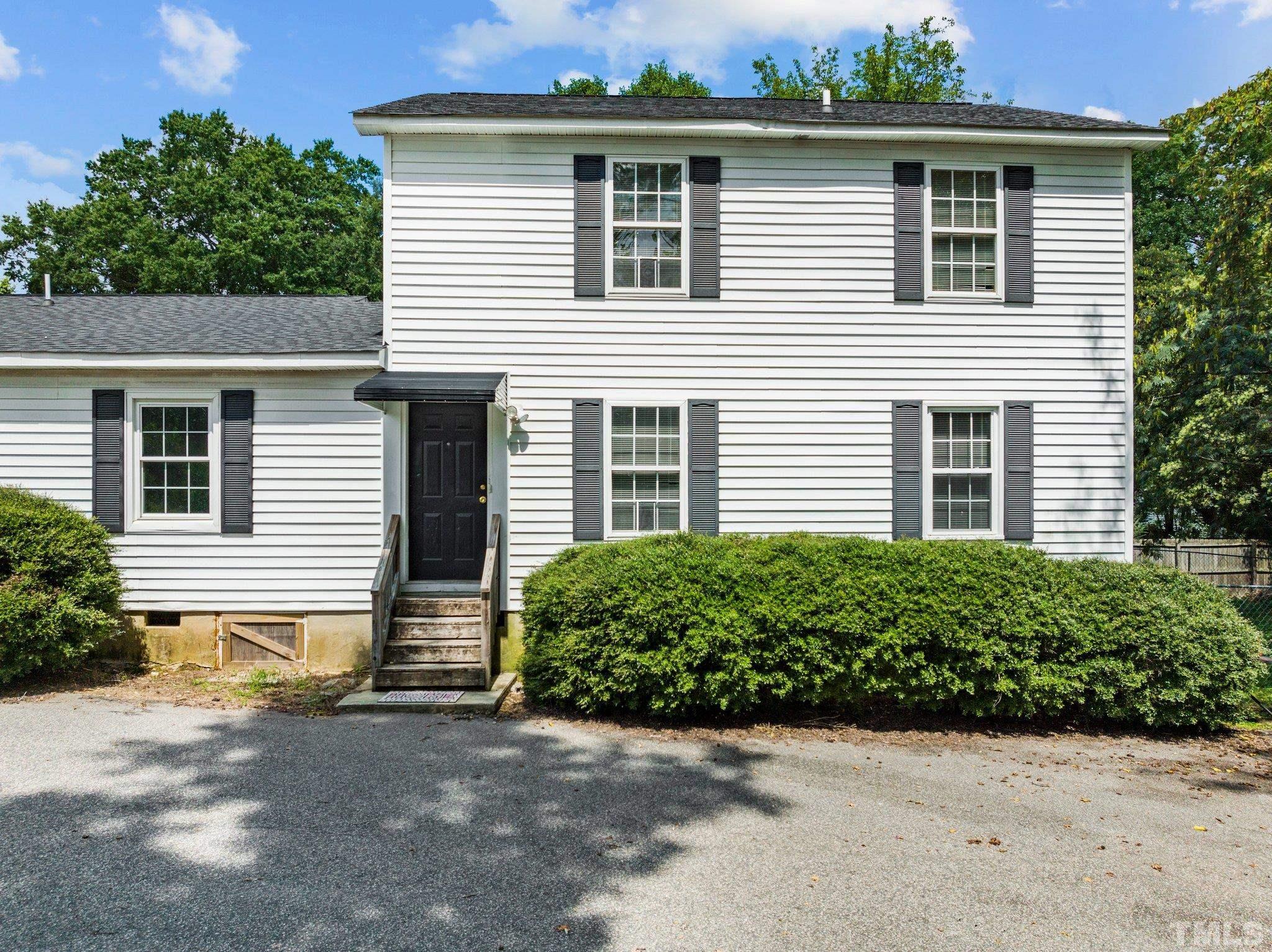 405 Jones Franklin Road Raleigh, NC 27606 - Photo 5 of 41 a house with a outdoor space
