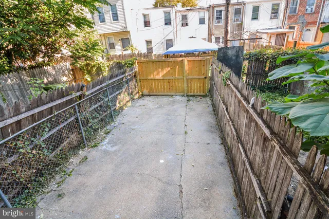 a view of a pathway with a building in the background